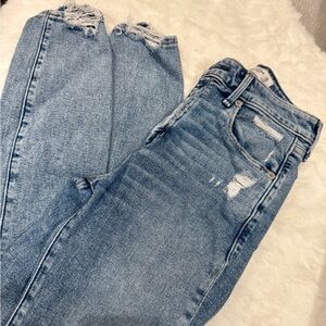 Women's Distressed Blue Jeans